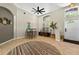 Inviting home entryway with high ceilings, modern decor, and natural light filling the space at 6542 Lake Pembroke Pl, Orlando, FL 32829