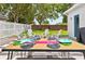 Cozy backyard patio with outdoor seating, perfect for enjoying meals and relaxation outdoors at 6542 Lake Pembroke Pl, Orlando, FL 32829