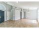 Open-concept living area featuring tile flooring and ample natural light at 6702 Imperial Oak Ln, Orlando, FL 32819