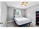 Bedroom featuring a ceiling fan, natural light and vinyl plank flooring at 7741 Pine Hollow Ct, Orlando, FL 32822
