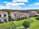 Home exterior showing lawn, black metal fence and covered patio at 8150 Prestbury Dr, Orlando, FL 32832