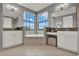 Bright bathroom with a garden tub, double sink vanity, granite countertops, and large windows providing lots of natural light at 8150 Prestbury Dr, Orlando, FL 32832