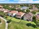 A well-manicured, fenced yard and a walking path complements these stunning two-story homes in a vibrant neighborhood at 8150 Prestbury Dr, Orlando, FL 32832