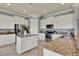Spacious kitchen with island, granite countertops, and stainless steel appliances at 8150 Prestbury Dr, Orlando, FL 32832