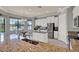 Bright eat-in kitchen with stainless steel appliances and granite countertops at 8150 Prestbury Dr, Orlando, FL 32832