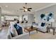 Open-concept living room flows seamlessly into the modern kitchen area at 8150 Prestbury Dr, Orlando, FL 32832
