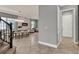 Spacious living room features a fireplace and a chandelier, creating an inviting atmosphere at 8150 Prestbury Dr, Orlando, FL 32832