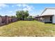 Large backyard with brick fence at 831 Islander Ave, Orlando, FL 32825