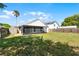 View of backyard with a shed and fenced in area at 831 Islander Ave, Orlando, FL 32825