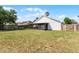 Spacious backyard with lawn at 831 Islander Ave, Orlando, FL 32825