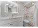 Bathroom with a shower-tub combination and large lighted mirror at 831 Islander Ave, Orlando, FL 32825