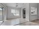 Dining room featuring wood flooring, a slider to the patio, and great natural light at 831 Islander Ave, Orlando, FL 32825