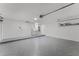 Spacious garage featuring a laundry area and plenty of room for parking and storage at 831 Islander Ave, Orlando, FL 32825