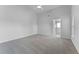 Spacious main bedroom with neutral walls, carpet floor, a ceiling fan, and great natural light at 831 Islander Ave, Orlando, FL 32825