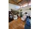 Spacious living room featuring hardwood floors and a seamless transition to the dining area at 5964 Peregrine Ave # C02, Orlando, FL 32819