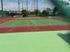 Outdoor tennis courts provide residents with a fun activity and recreation space at 5964 Peregrine Ave # C02, Orlando, FL 32819
