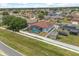 Bird's-eye view of a single-Gathering home with a screened-in pool and a fenced-in yard at 10 Alicante Ct, Kissimmee, FL 34758