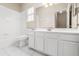 Bathroom features a single sink vanity and a combined tub and shower at 10 Alicante Ct, Kissimmee, FL 34758