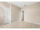 Neutral bedroom features tile floors, light walls, closet and doorway to other rooms at 10 Alicante Ct, Kissimmee, FL 34758