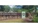 Attractive Randal Park community sign with stone base and manicured landscaping at 10658 Bannan St, Orlando, FL 32832