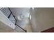 Foyer with tall ceilings, a decorative chandelier, and stairs with black railings at 10658 Bannan St, Orlando, FL 32832