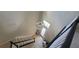 Elegant foyer with tiled floors, carpeted stairs, and a stunning chandelier at 10658 Bannan St, Orlando, FL 32832