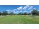 Expansive community green space provides a park-like setting, perfect for recreation at 10658 Bannan St, Orlando, FL 32832