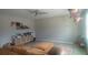 Bright and spacious living room features modern furniture, tile flooring, and ample natural light at 10658 Bannan St, Orlando, FL 32832
