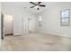 Bedroom featuring carpeted floor and multiple access doors at 11255 Se 170Th Pl, Summerfield, FL 34491
