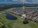 Beautiful aerial shot showcasing the home's location within a serene community with lakes and green spaces at 13139 Stanthorne Ave, Orlando, FL 32832