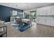 Elegant dining area with stylish lighting, a modern table set, and access to the outdoor patio at 13139 Stanthorne Ave, Orlando, FL 32832