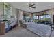 Bright living room with comfy seating, plush rug, and sliding glass doors that provide views of the outdoor patio at 13139 Stanthorne Ave, Orlando, FL 32832
