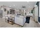Expansive living room with an open layout, stylish furnishings, and hardwood floors provides ample space at 13139 Stanthorne Ave, Orlando, FL 32832