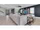 Inviting living room with a large comfortable sofa, entertainment center, and stylish decor at 13139 Stanthorne Ave, Orlando, FL 32832