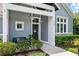 Inviting front porch with seating, plants, and charming details that create a welcoming entry at 1330 W Harvard St, Orlando, FL 32804