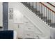 Under-stair storage featuring built-in cabinets and drawers for optimal organization and functionality at 1330 W Harvard St, Orlando, FL 32804