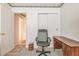 Bedroom featuring a desk and rolling office chair at 1354 S Shore Dr, St Cloud, FL 34771