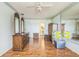 Spacious bedroom with hardwood floors, mirrors, and lots of natural light at 1354 S Shore Dr, St Cloud, FL 34771