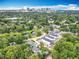This aerial view shows the property's proximity to nearby lakes, lush greenery and downtown at 1414 Beaver Pl, Orlando, FL 32806