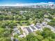 This aerial view shows the property's proximity to nearby lakes, lush greenery and downtown at 1414 Beaver Pl, Orlando, FL 32806