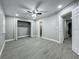 Bedroom featuring tile floor, closet, neutral walls, and access to bathroom and hallway at 1414 Beaver Pl, Orlando, FL 32806