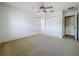 Bedroom featuring a ceiling fan and closet space at 1513 Blue Sky Way, Clermont, FL 34714