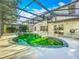 Beautiful screened-in pool and spa with ample deck space for entertaining and relaxing at 1513 Blue Sky Way, Clermont, FL 34714