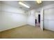 Walk-in closet with carpet and wire shelves, leading to the main house at 1513 Blue Sky Way, Clermont, FL 34714