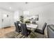 Modern dining room featuring a contemporary chandelier, decor, and comfortable seating at 16162 Arbor Crest Aly, Winter Garden, FL 34787