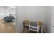 Office nook features built-in desk and white chair for easy work from home at 16162 Arbor Crest Aly, Winter Garden, FL 34787