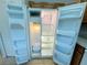 Open view of the refrigerator showing storage space at 1625 Priory Cir, Winter Garden, FL 34787