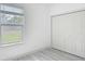 Bright bedroom with a window and closet storage at 16253 Sw 29Th Court Rd, Ocala, FL 34473