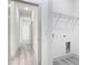 Hallway with new floors and coat closet at 16253 Sw 29Th Court Rd, Ocala, FL 34473