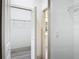 Walk-in closet featuring wire shelving and access to the bathroom at 16253 Sw 29Th Court Rd, Ocala, FL 34473